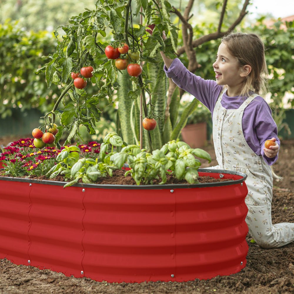 raised beds for gardening with a child planting