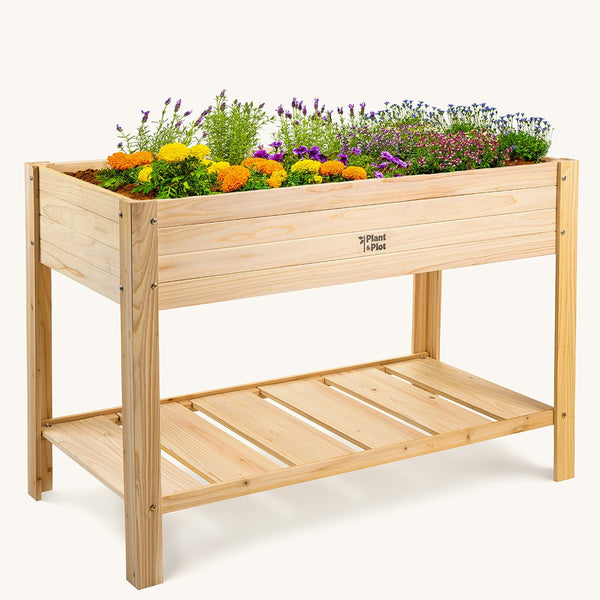 raised planter box with flowers