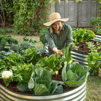 woman gardening using a outdoor planter