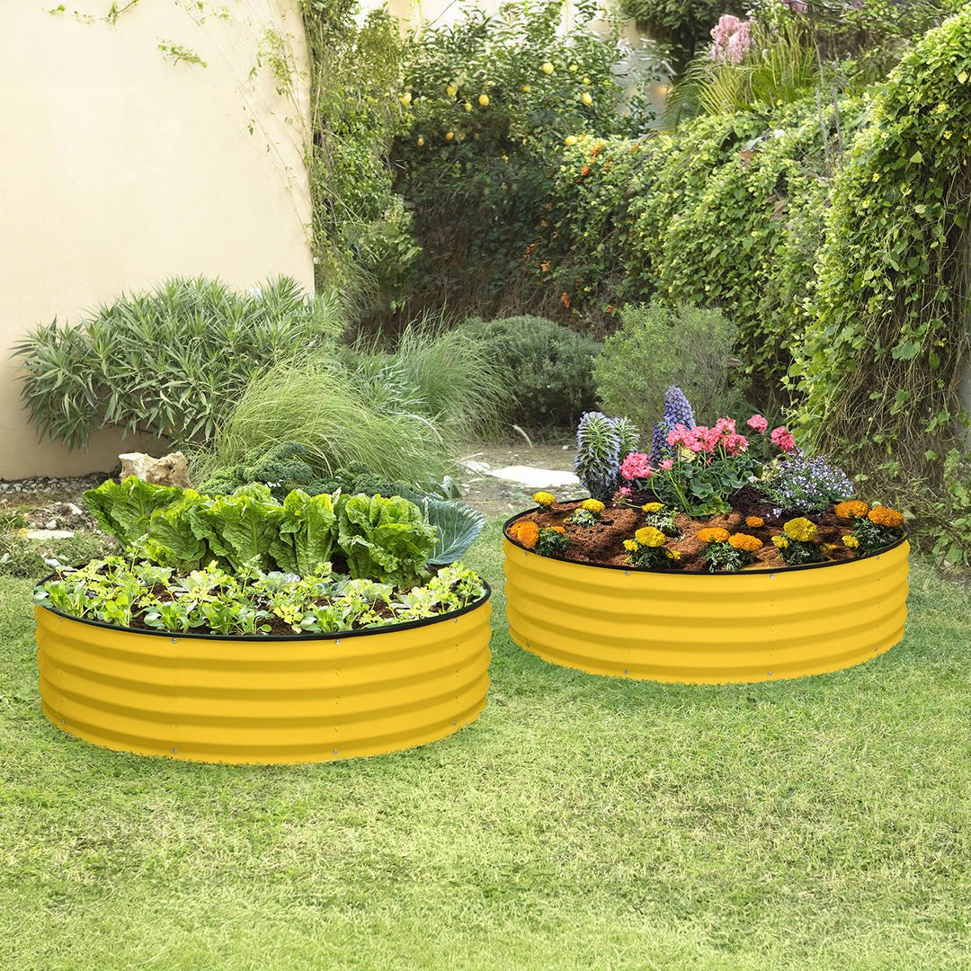 yellow galvanized raised garden bed on grass