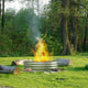 galvanized round planter used as a fire ring