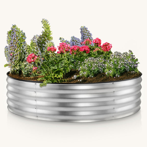 galvanized raised garden bed round with flowers inside