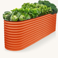 orange metal raised garden bed with plant