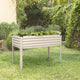 metal white elevated garden bed with plants