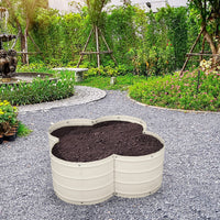 white flower shaped metal garden bed