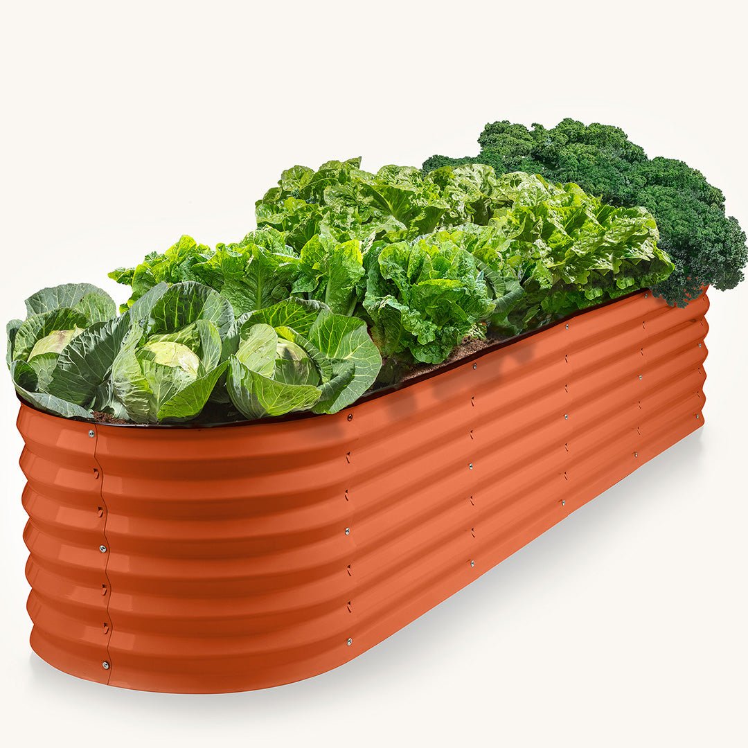 orange metal garden bed with vegetable plants