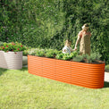 mother and child next to a metal raised garden bed