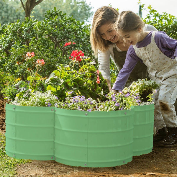 plant pots in green with mother and child planting