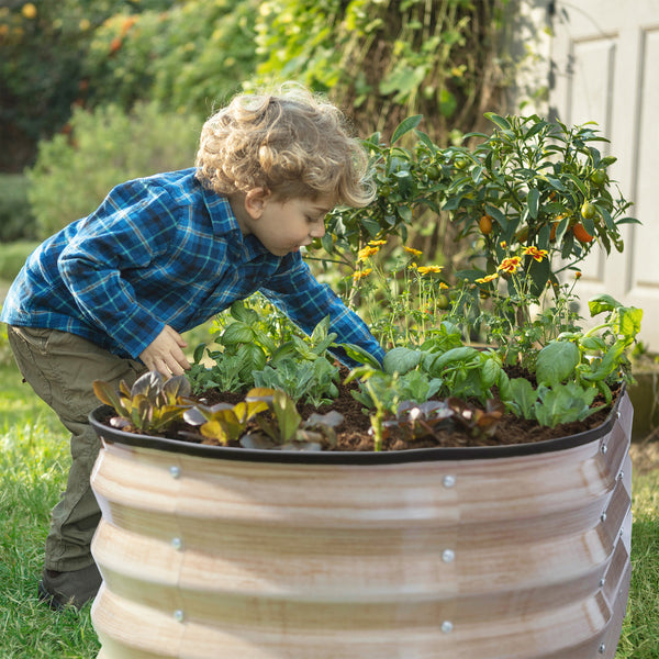 raised beds for gardening with child planting